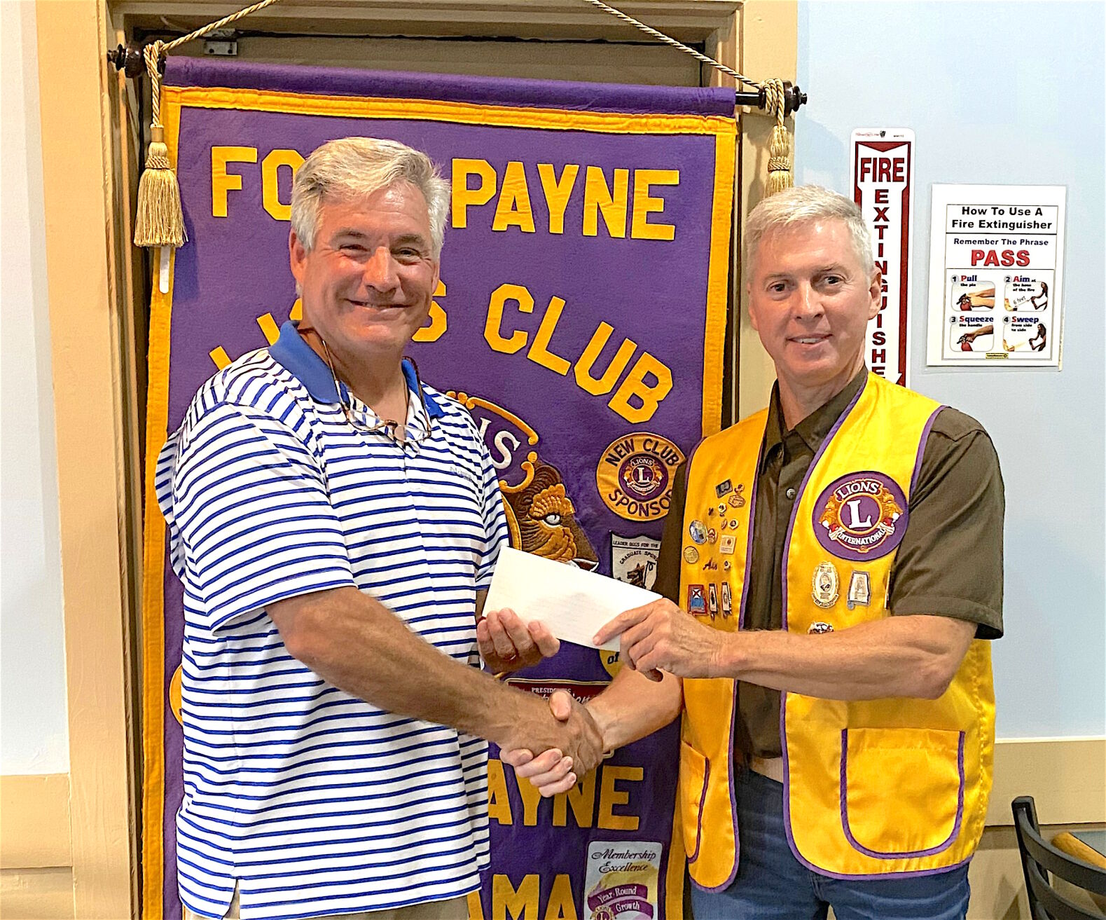 Lions Club presents Ponderosa Camp with check for foster care program
